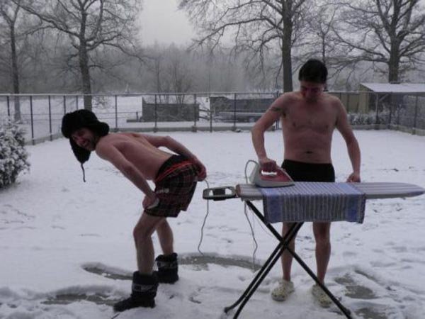 crazy-guys-irioning-open-in-snowfall