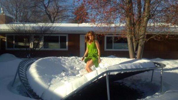 funny-girl-jumping-in-snow-fall