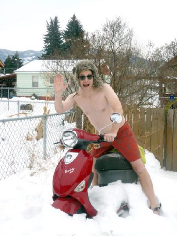 funny-guy-without-clothes-in-snow-biking