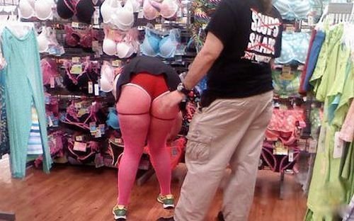 red-short-shorts-pink-stockings-and-green-shoes-at-walmart-funny-pictures-at-walmart-fun-walmartians-ghetto-trash-crazy-people-at-walmart-wal-mart-funnies-